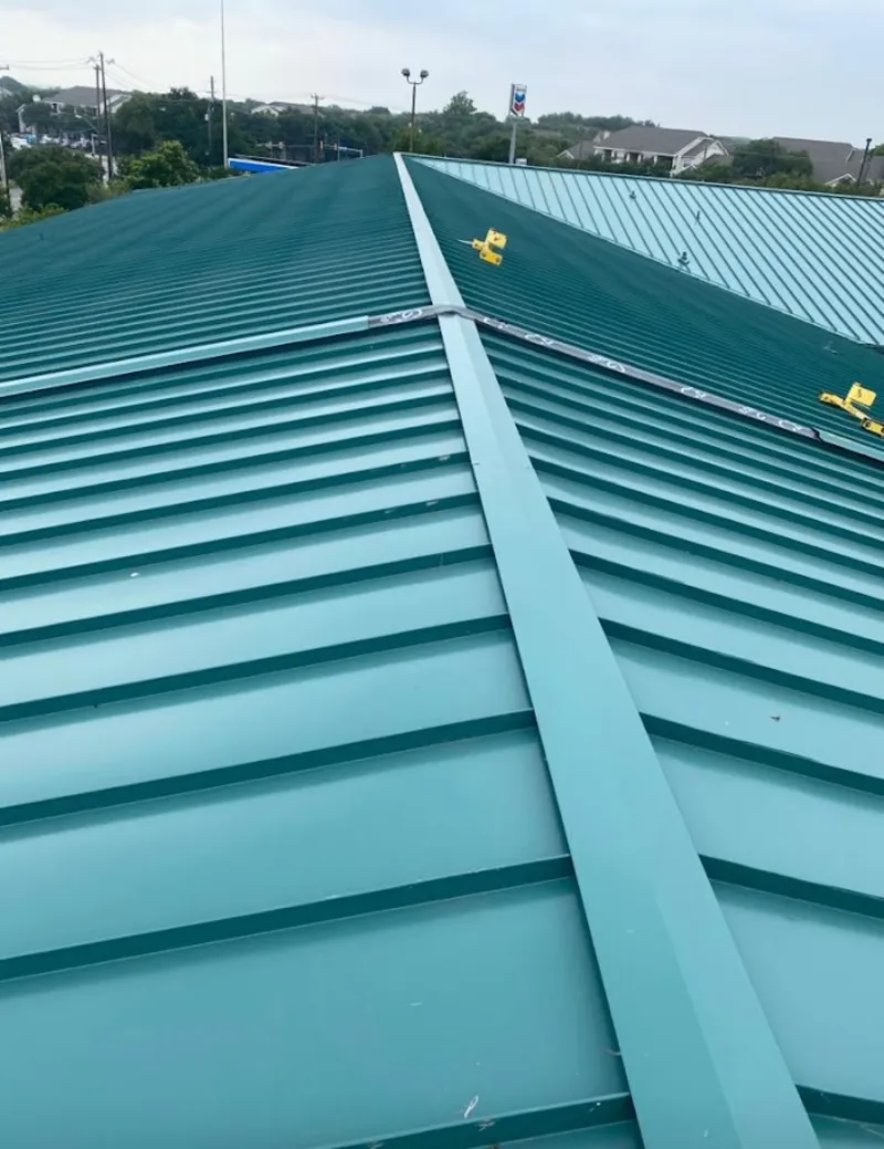 Green commercial metal roof ridge and valley for Metal Roof Repair in Highland